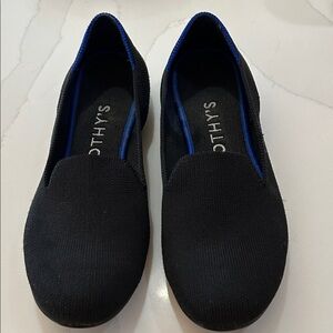 Rothy's Black Slip-Ons with Blue Trim